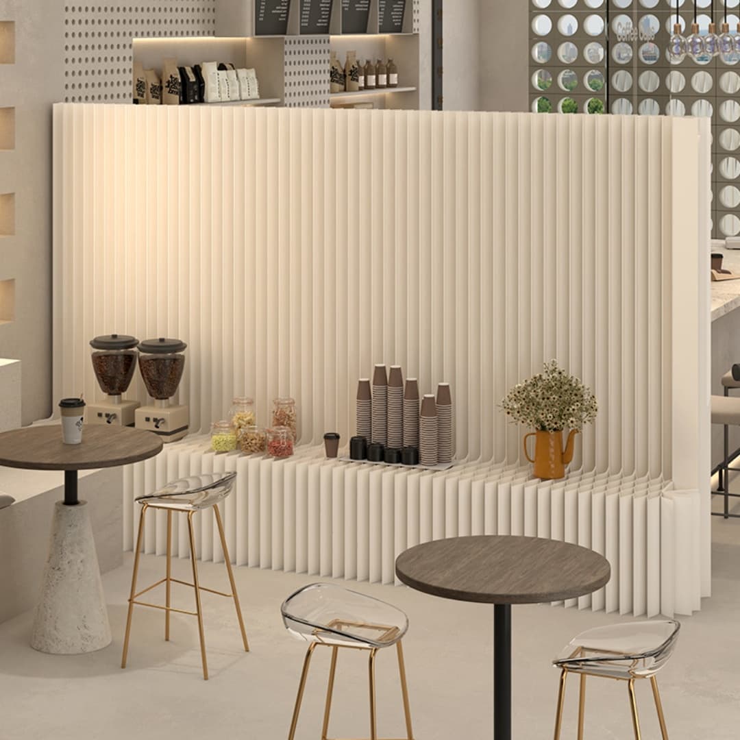 Paper display wall separating tables in a cafe