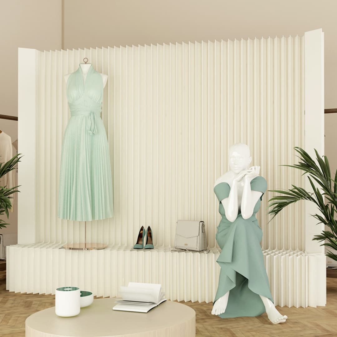 Paper display wall used as a backdrop in a clothing store with mannequins
